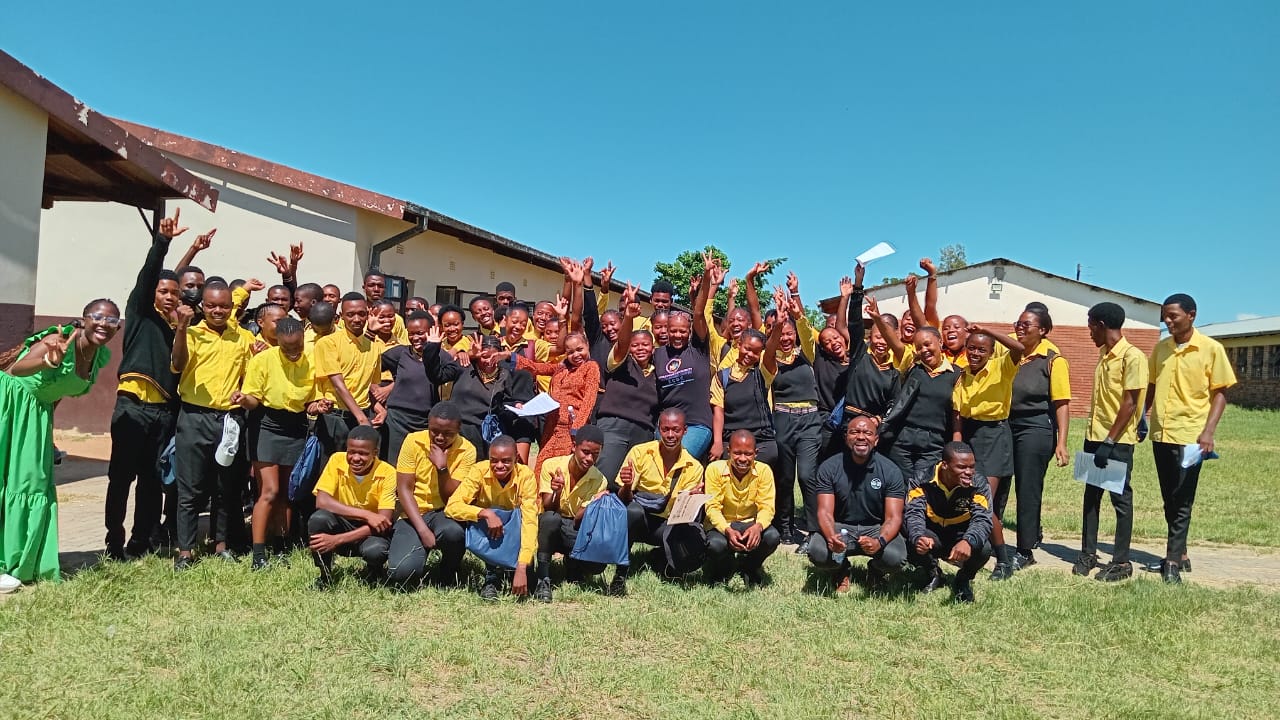 Grade 12 students and their teachers/mentors posing for a group photo at Thejane High School during the Endeavour Assembly Motivation event, January 2025.